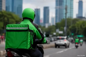 Komdigi Pastikan Aturan Ojol dan Kurir Barang Dipisah