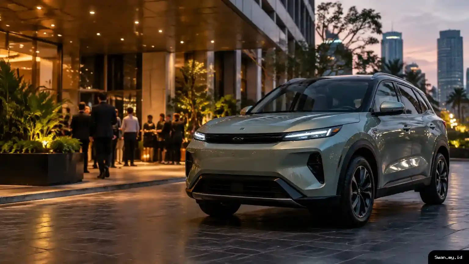 A compact electric SUV sits on display outside a modern Jakarta event venue, with attendees and soft architectural lighting in the background. Compact electric SUV displayed at a Jakarta event