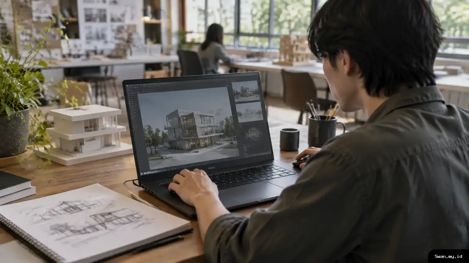 Student uses a laptop for 3D design work