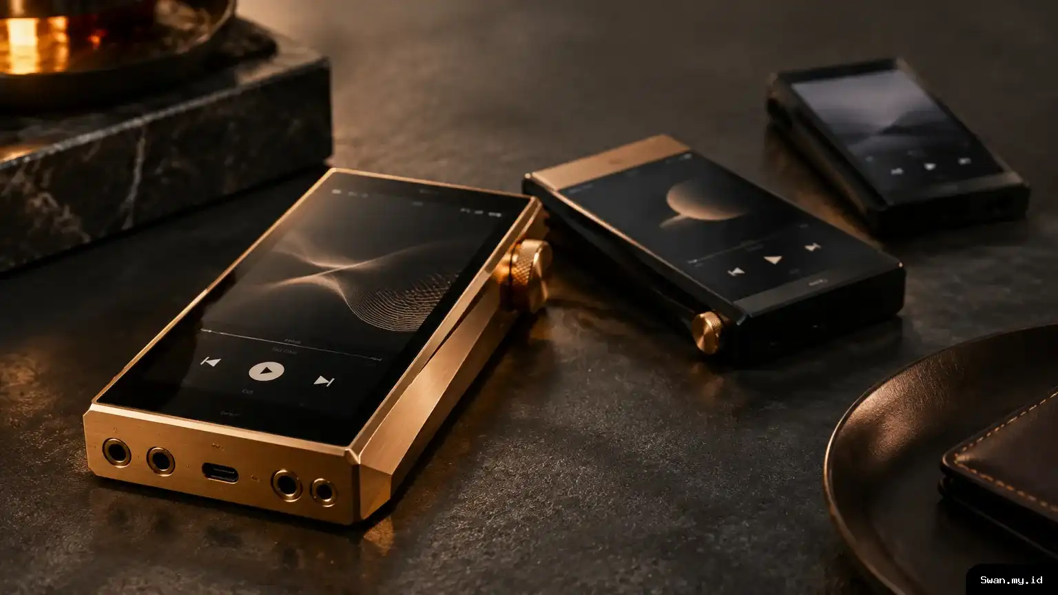 A studio arrangement depicts three premium portable music players with differing body finishes, representing the three models in Sony’s latest Walkman range. Three premium Sony Walkman players with distinct finishes