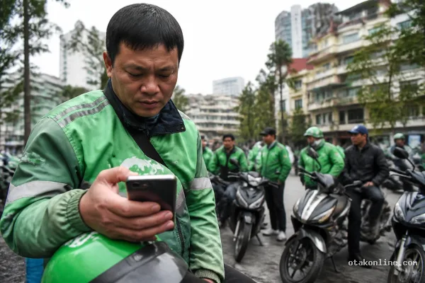 Pengemudi Grab Vietnam Protes Perubahan Skema Pembayaran Pengemudi Grab Vietnam Protes Perubahan Skema Pembayaran